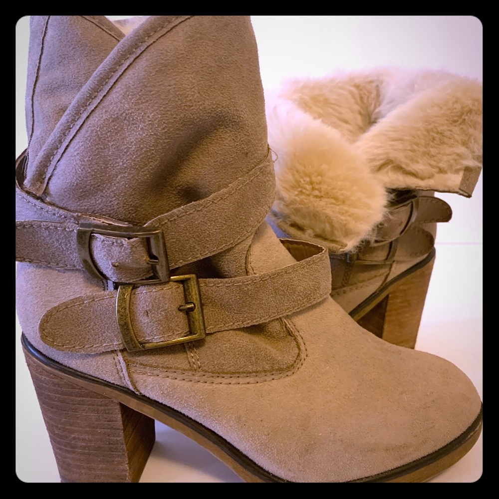 Tan boots with a heel, furry on the inside!